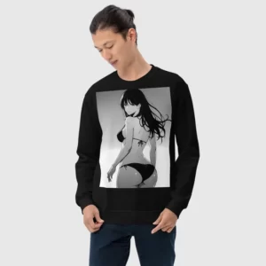 A man wearing a black sweatshirt with a manga design of an anime girl in bikini