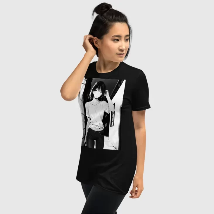 A woman wearing a black shirt with a manga design of an anime girl in the neighborhood