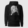 A black hoodie with a manga design of an anime girl in winter