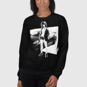 A woman wearing a black sweatshirt with a manga design of an anime girl and car