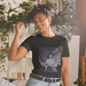 A woman with plants in the background wearing a black shirt with a design of a 90s anime girl in the middle of the road in a retro vintage style