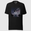 A black t-shirt with a design of a 90s anime girl in the middle of the road in a retro vintage style