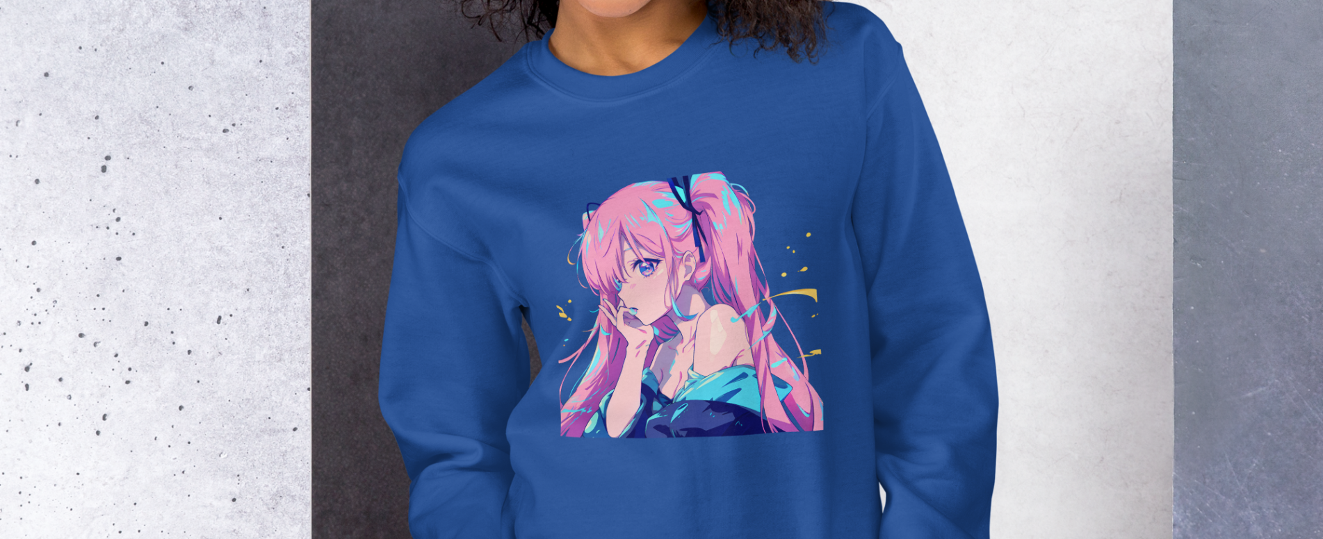 A woman wearing a blue sweatshirt with a design of a pink hair anime girl