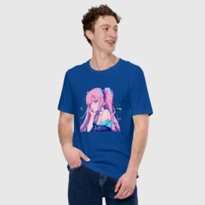 A man with his hands in his pocket wearing a blue shirt with a design of a pink hair anime girl